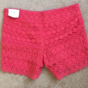 Pink lace shorts.